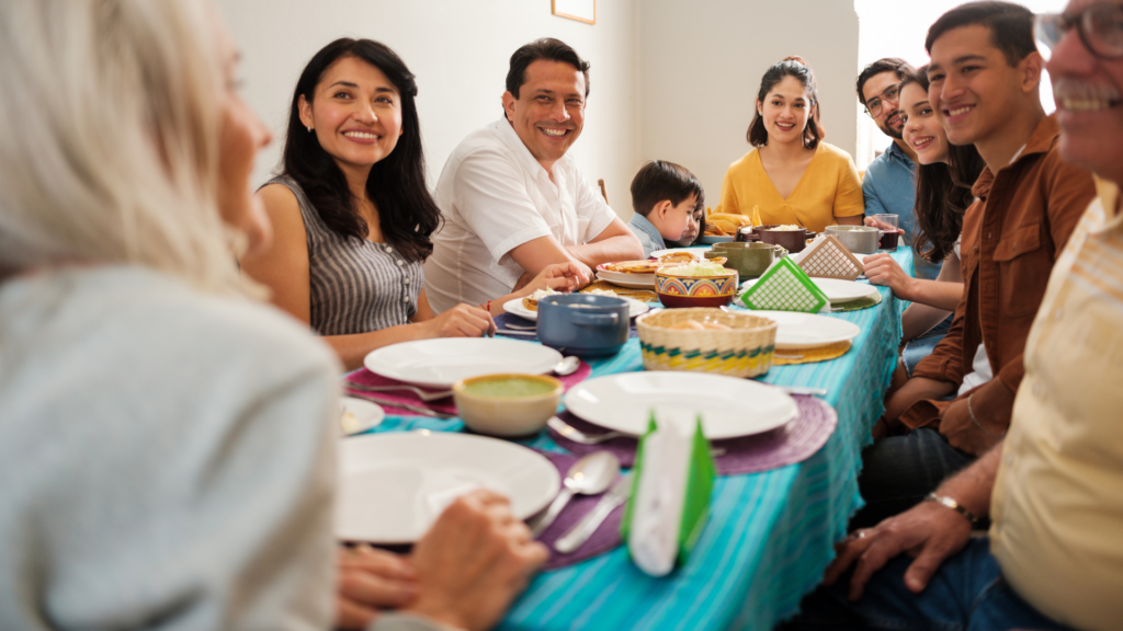 hispanic family eating together